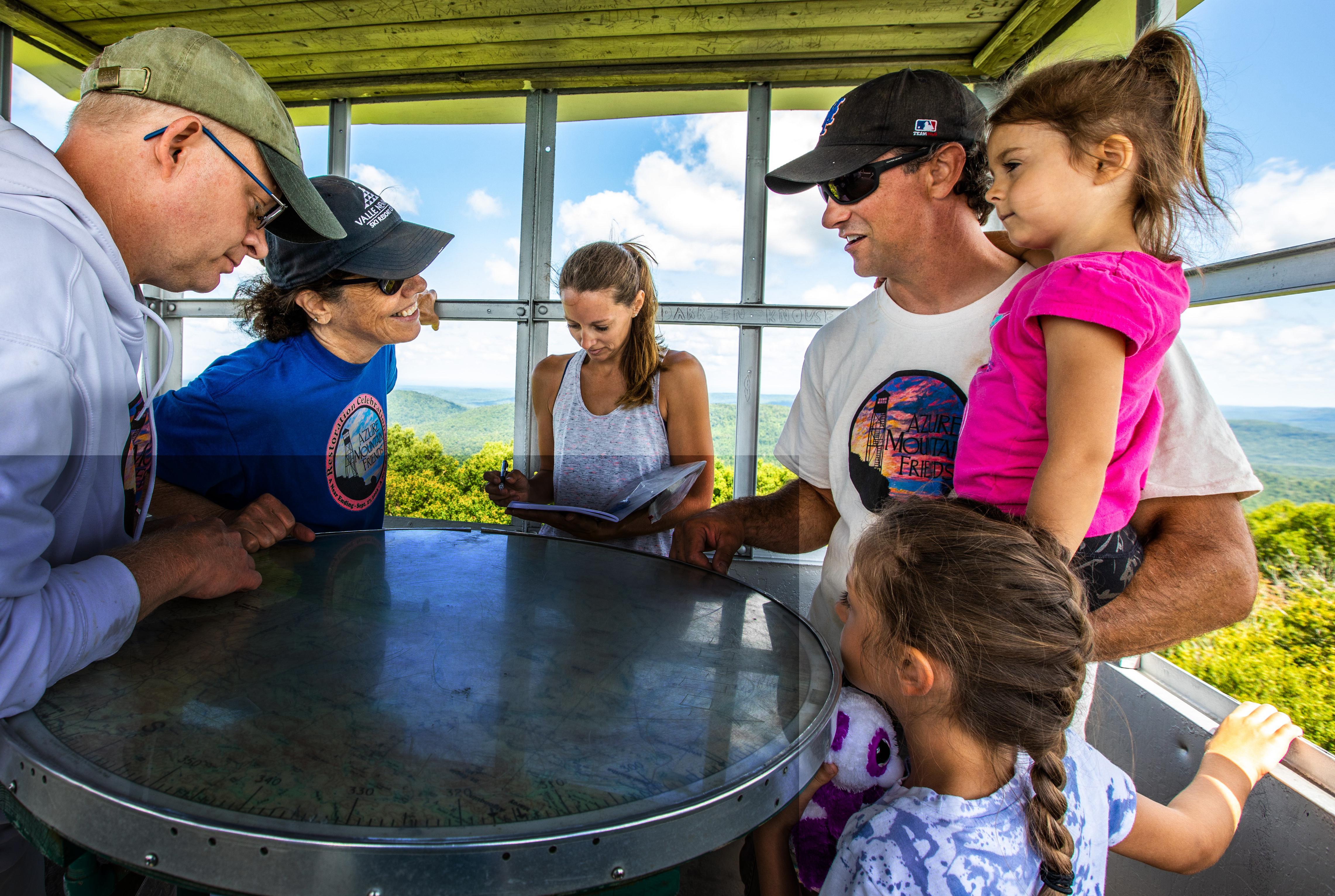 family in a fire tower